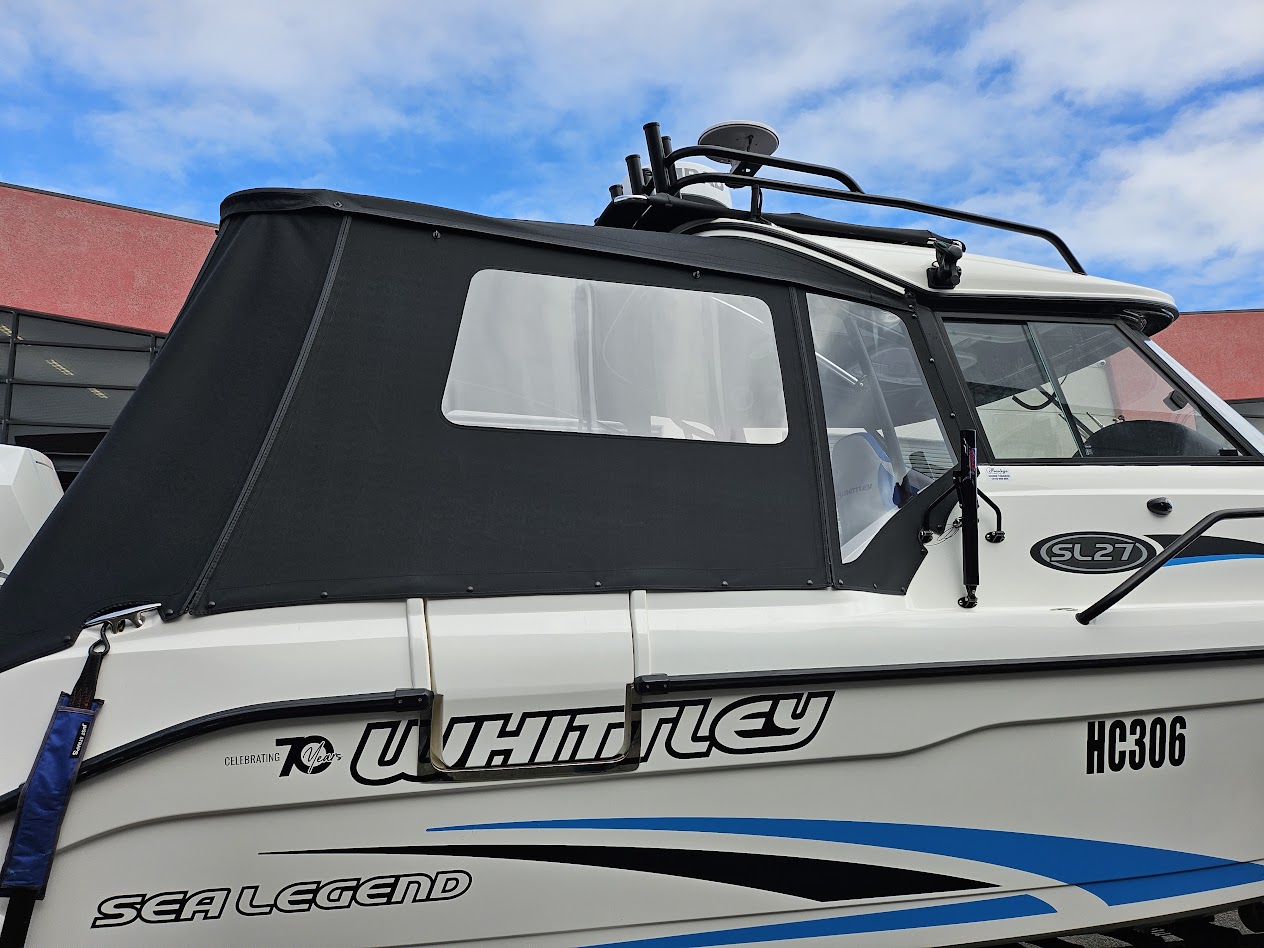 Whittley SL27 fitted with a full rear camper cover at the workshop